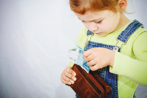 A child steals money from parents